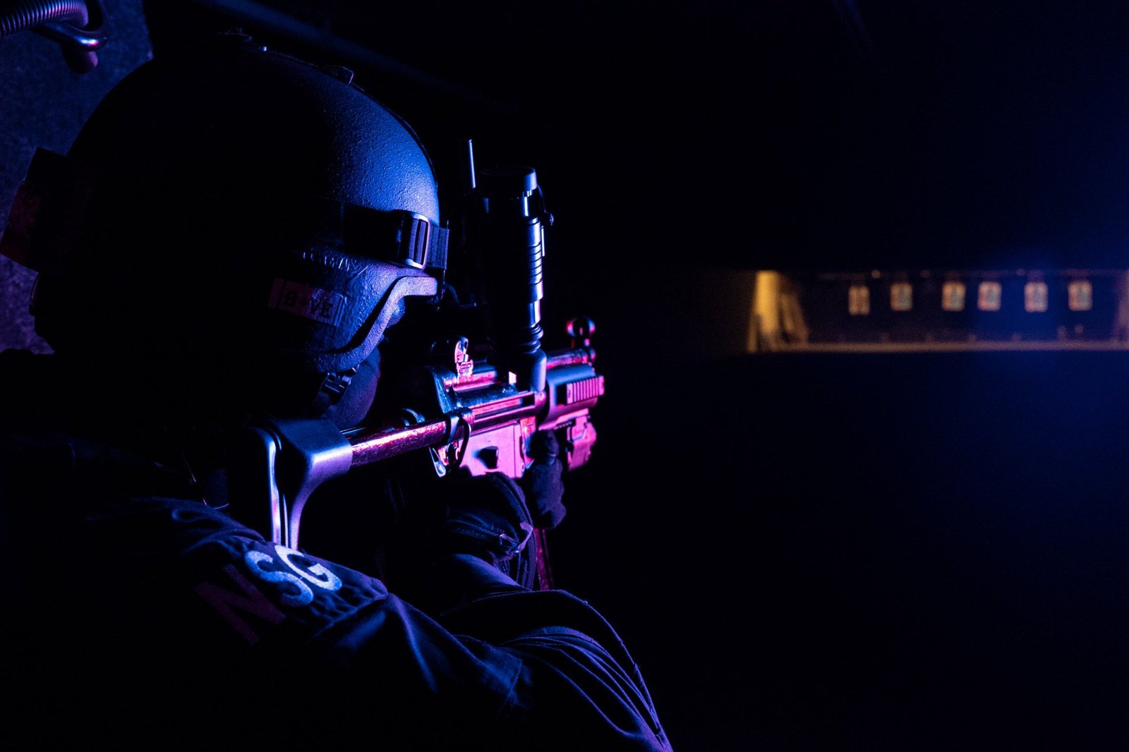 The eye, the sight and the target: precision-fire training at an indoor range.