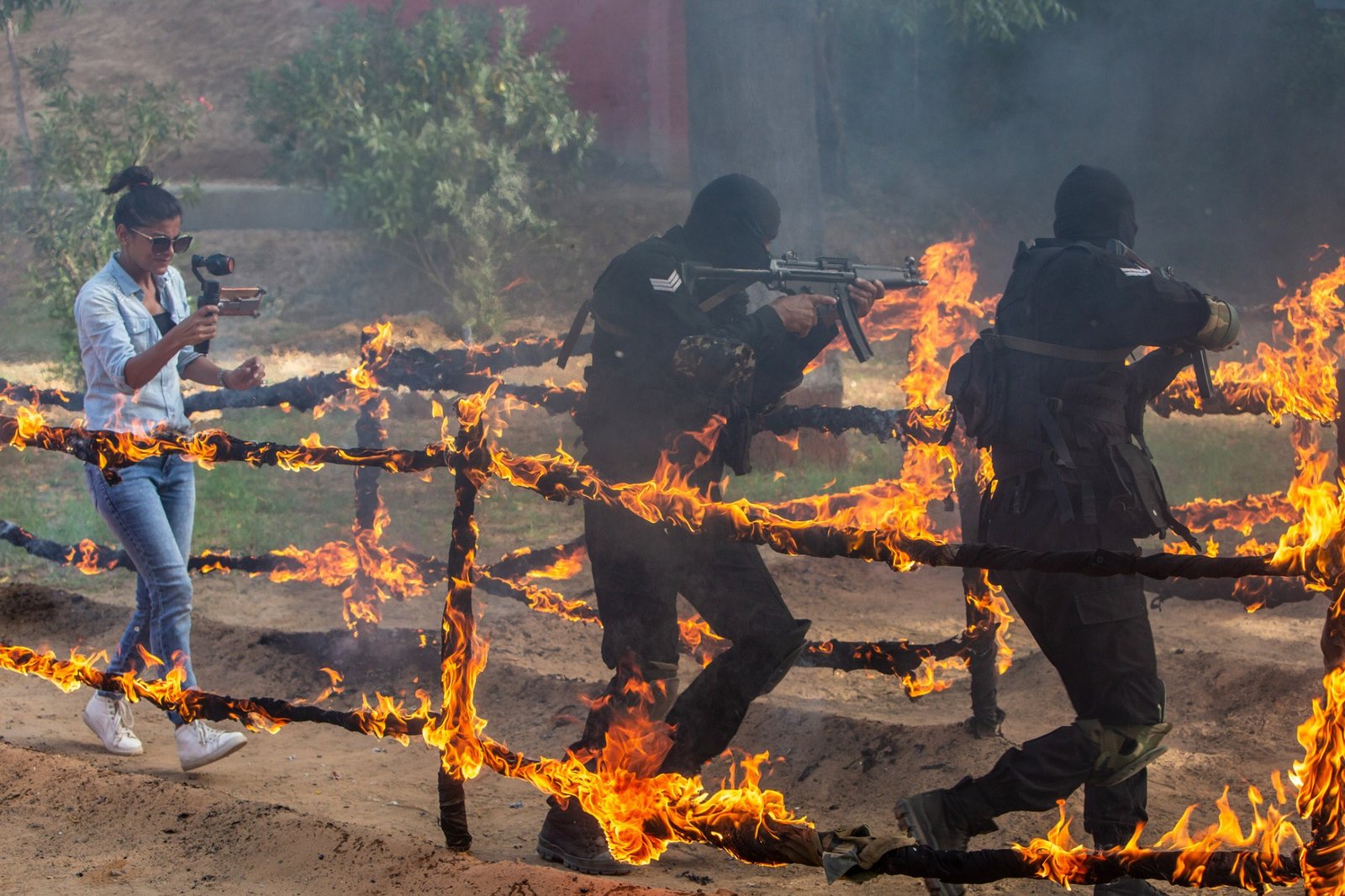 Rupali Talan filming NSG commandos at the fire-maze obstacle.