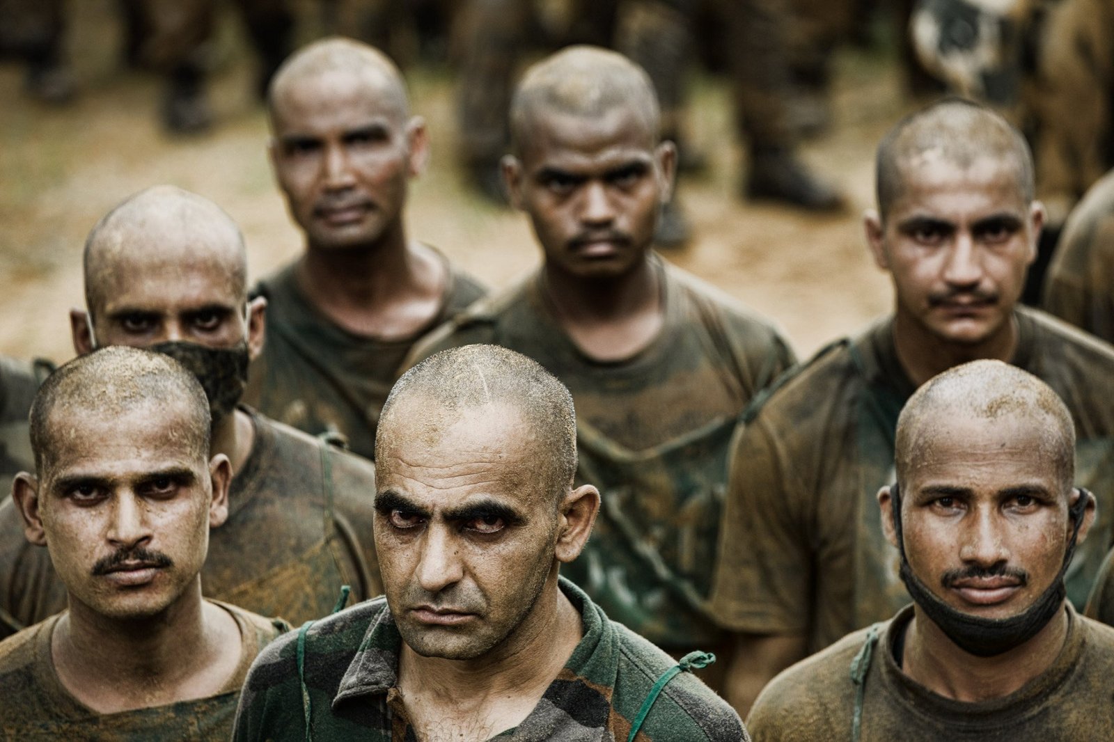 Shaved heads. Fixed gazes. The faces of trainees immediately after a gruelling session.